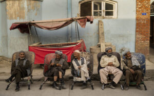 Laborers wait in the street to be hired, in Kabul, Afghanistan, Sunday, Sept. 12, 2021. (AP Photo/Bernat Armangue)